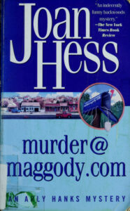 Murdermaggodycom Joan Hess Kitap Kapağı
